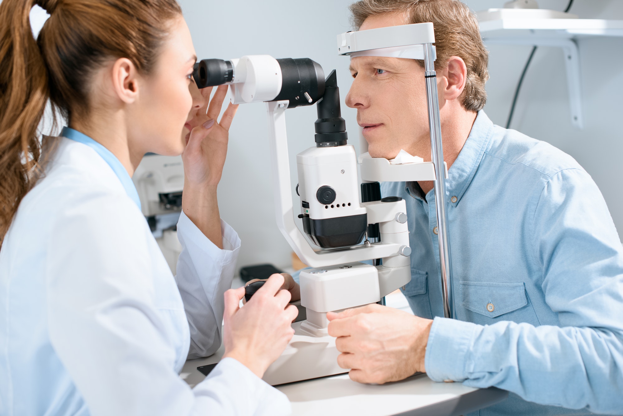 professional-oculist-examining-man-with-visual-field-test.jpg